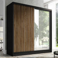 A&J MöbelLand Kleiderschrank, 200 cm, Schwarz/Holz, Schwebetürenschrank LINA mit Spiegel, 3 Schubladen & 3D-Lamellen (Schwarz)